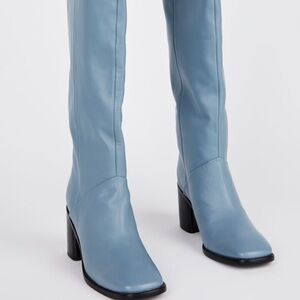 Intentionally blank coucou blue knee high boots
